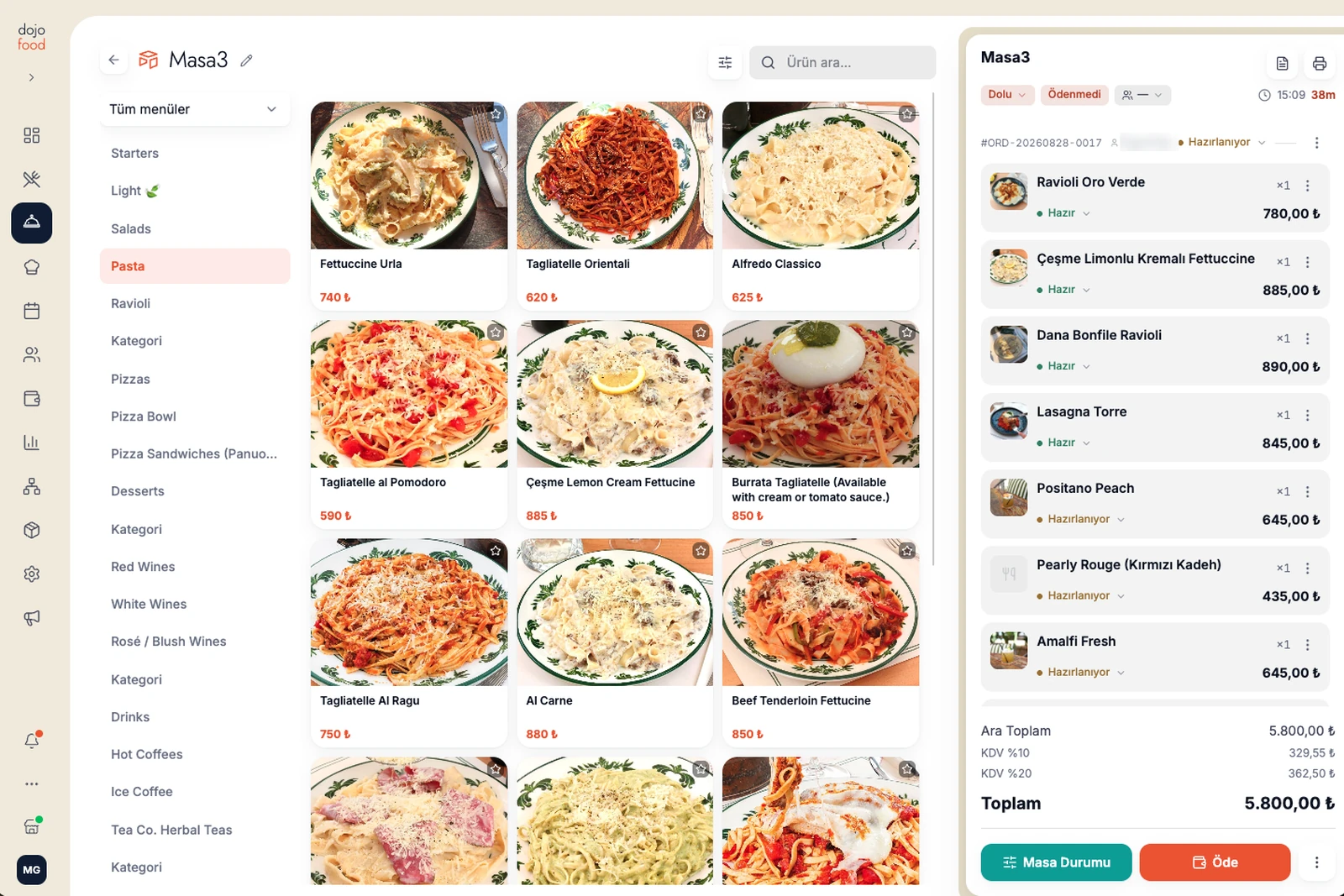 The dojofood POS order screen: menu categories on the left, item cards in the middle, the table's open check on the right